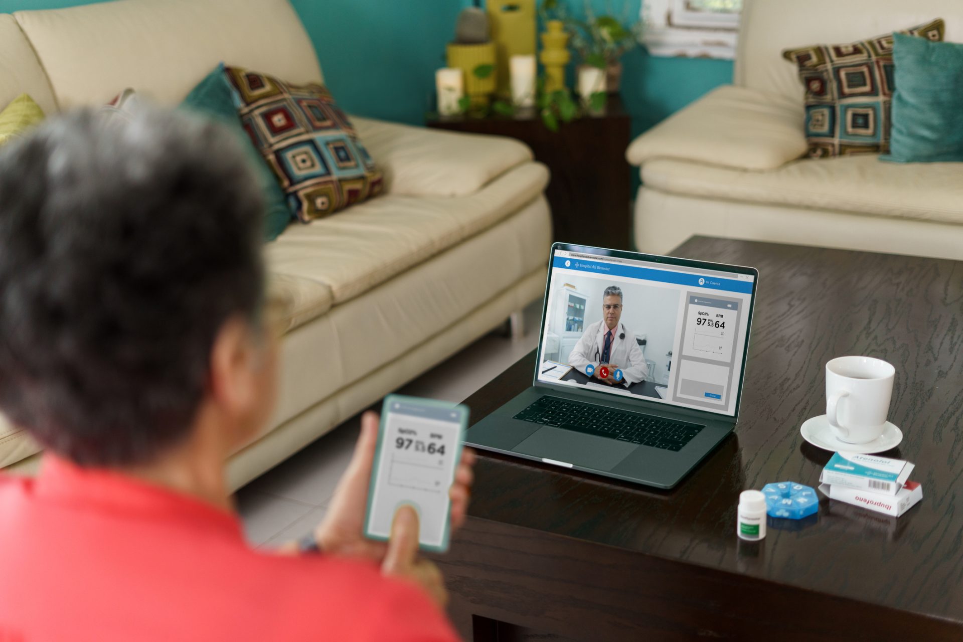 Senior woman at home using medical device for remote consultation
