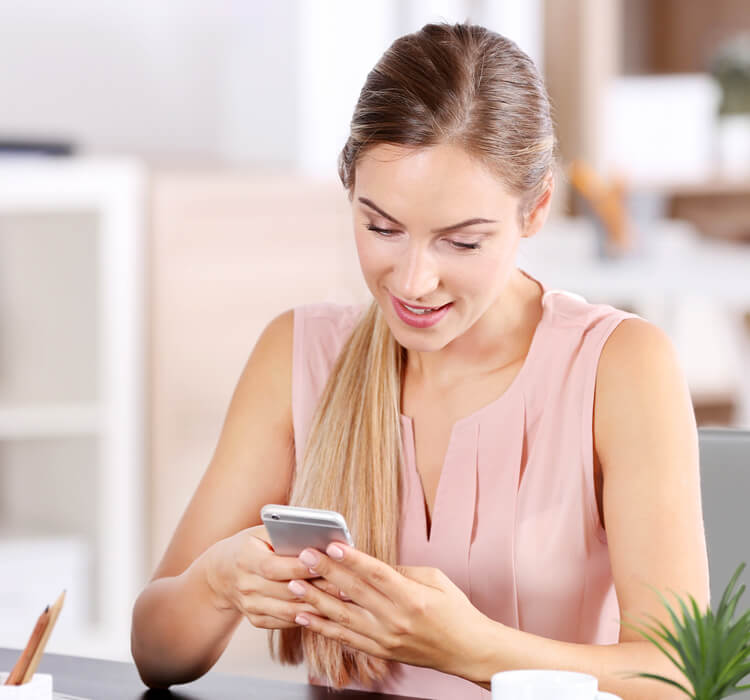 Woman Receiving Appointment Reminder on Phone